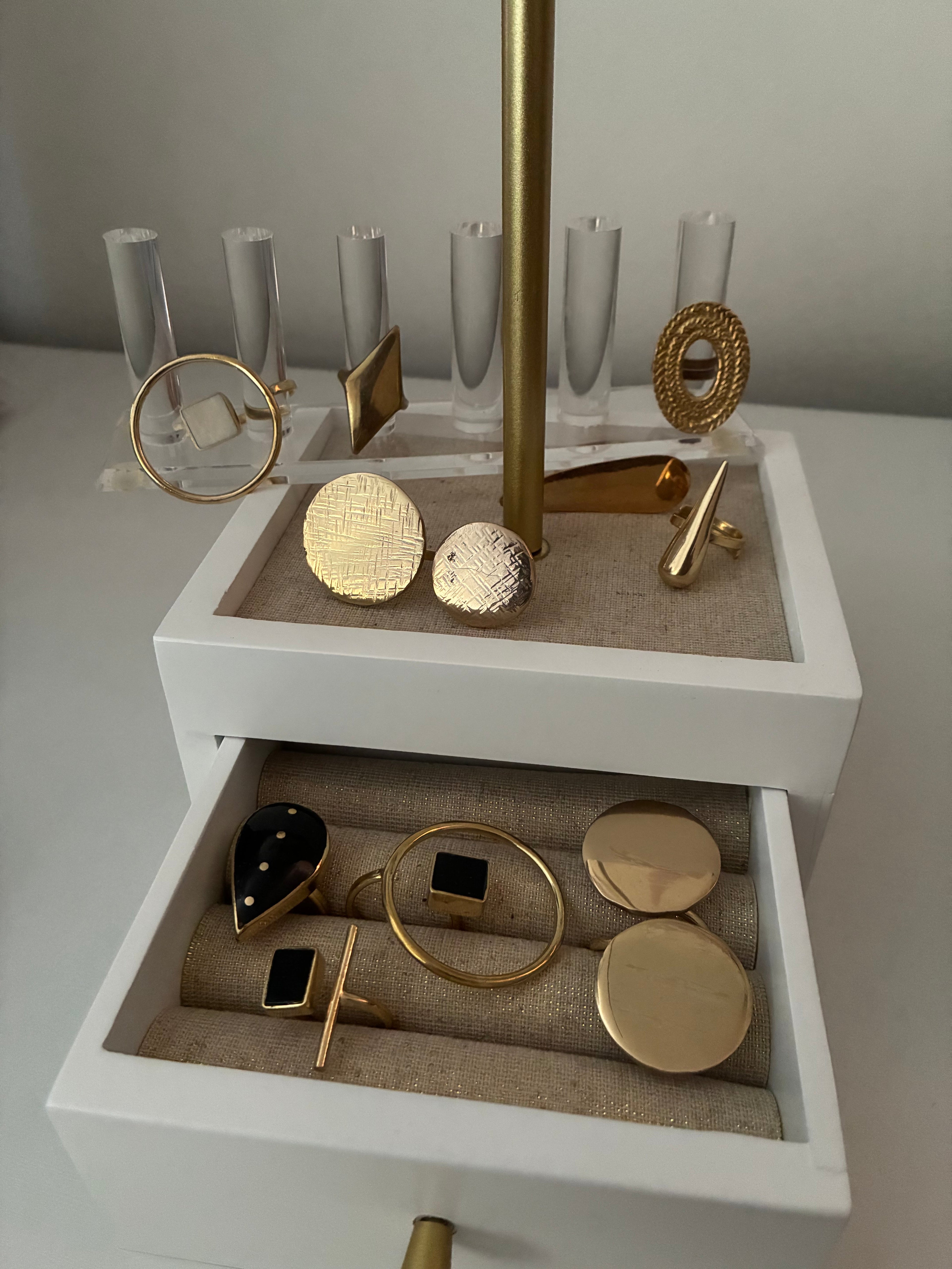 a collection of brass rings made in Kenya